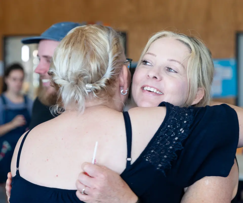 A warm welcome at a Rhythm community gathering